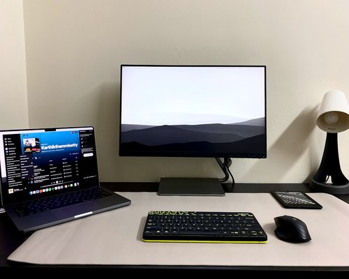 A clean desk setup showing a balanced work environment